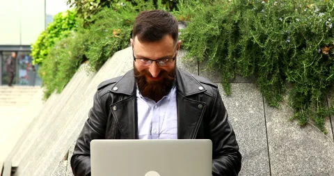 Bearded businessman working on laptop computer. Stock Footage 221897541