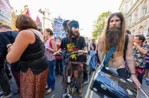 Bearded Climate Change protesters marching at an Extinction Rebellion demonst Stock Photos