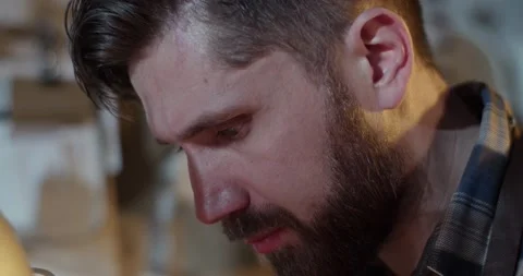 Bearded craftsman working in workshop Stock Footage 172488795