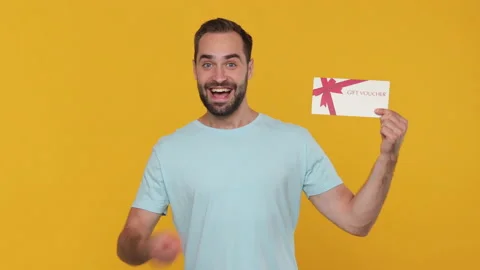 Bearded cute young man 20s in basic casual blue t-shirt isolated on yellow Stock Footage 148291509