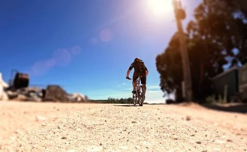 A bearded cyclist with a red helmet Stock Photos