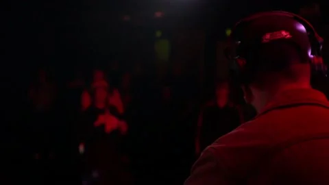 Bearded DJ on stage from behind Video stock 232757678