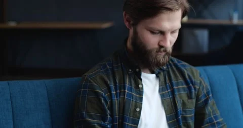  Bearded Freelancer is working concentrated on Work. Video stock 143294141