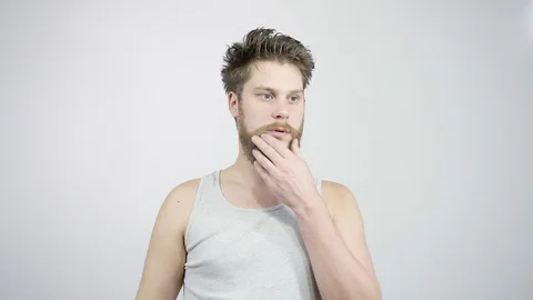 A bearded guy came up with a great idea to raise the thumb up Stock Footage 121682965