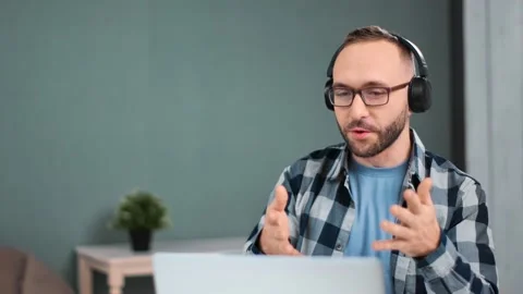 Bearded guy consulting online interview webinar use computer. Medium close up Video stock 145021200