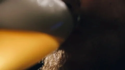 Bearded guy is drinking beer Stockbeeldmateriaal 75657226