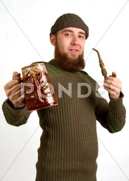 Bearded guy drinking beer Stock Photos