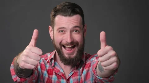 Bearded guy expresses great delight Stock Footage 311824445