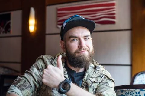A bearded guy. The guy shows the class Foto stock