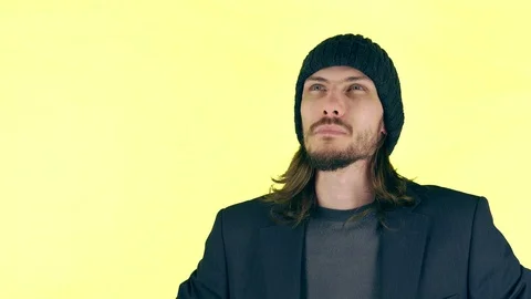 Bearded guy in a hat Stock Footage 102253981