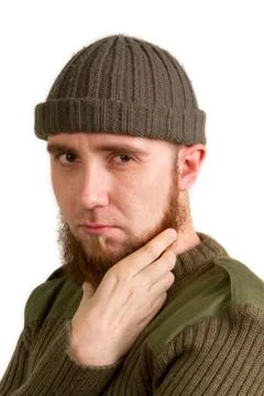 Bearded guy on a light background Stock Photos