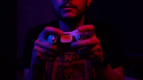 Bearded guy playing console. Have fun Stock Footage 126506445