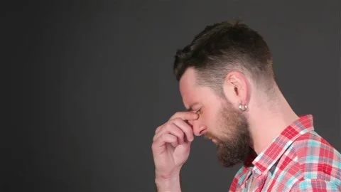 Bearded guy ponders a problem Stock-Footage 251463248