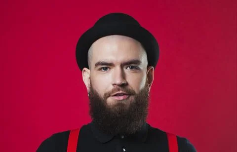 Bearded guy on a red background Foto stock