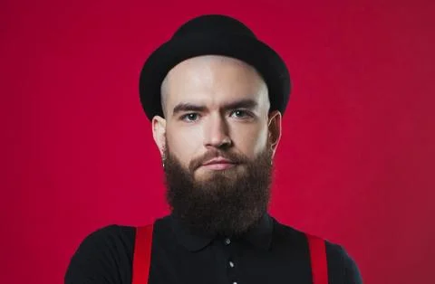 Bearded guy on a red background Foto stock