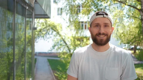 The bearded guy with yellow teeth smiling and showing thumb Stock Footage 129974011