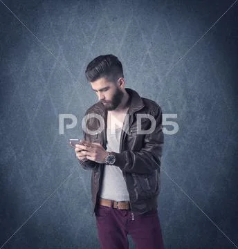 Bearded hipster standing in elegant clothes Stock Photos