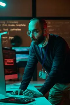 Bearded IT Engineer using Computer Foto stock
