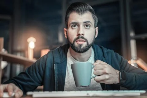 Bearded IT guy learning programming language Stock Photos