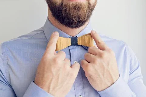 Bearded Man Adjusts Tie Stock Photos