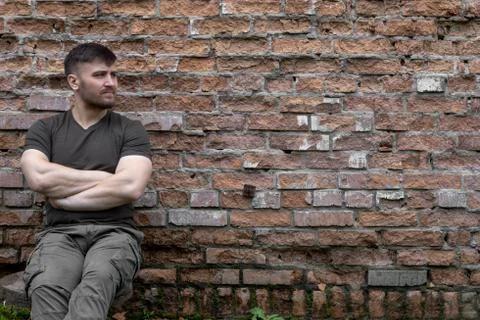 Bearded man on a background of a brick wall. Foto stock