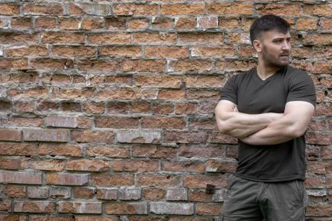 Bearded man on a background of a brick wall. Foto stock