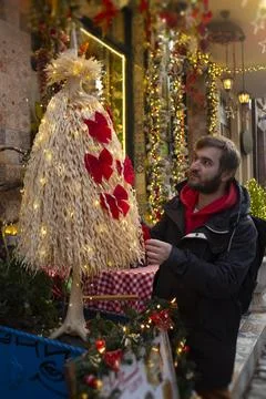 Bearded man in black jacket at Christmas market Stock Photos
