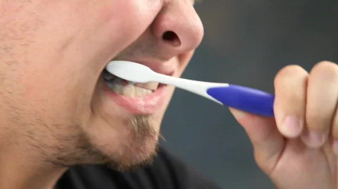 Bearded Man Brushing Teeth Stock Footage 846582