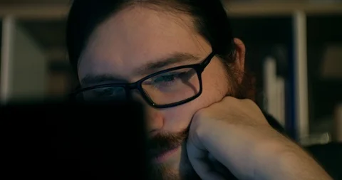 Bearded Man Chatting Browsing at late night - Close Up shot with Display Glasses Stock Footage 87323858