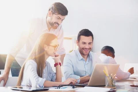 Bearded man checking results of workers Stock Photos