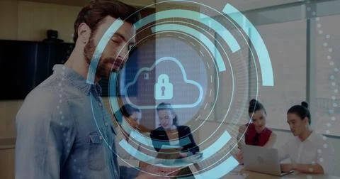 Bearded man checking smartphone in conference room, with laptop and cloud 스톡 사진