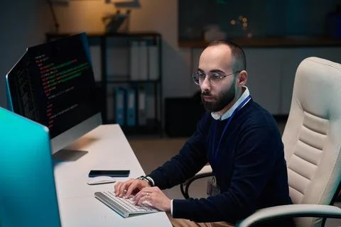 Bearded Man Coding Stock-Fotos
