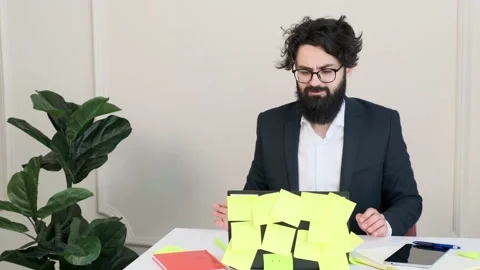 Bearded man comfortable at his desk, having a video call conference. Stock Footage 152647841