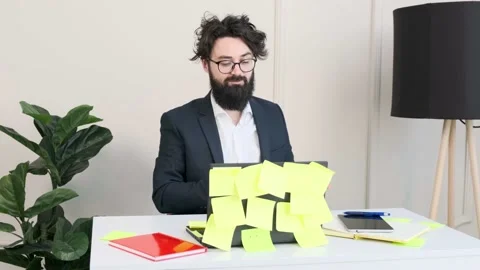 Bearded man comfortable at his desk, having a video call conference. Stock Footage 153165794