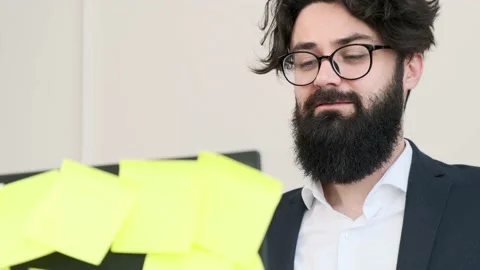 Bearded man comfortable at his desk, having a video call conference. Stock Footage 158451259