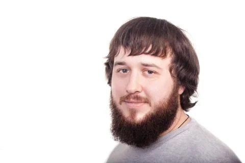 Bearded man confidently looking forward. Studio shot on white background Stockfoto's