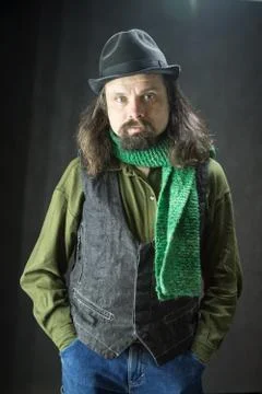 A bearded man covered a hat Stock Photos