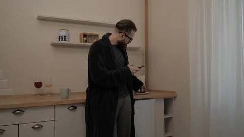 Bearded man with cup of tea Stock Footage 104022268