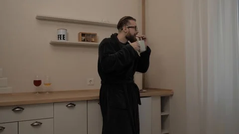 Bearded man with cup of tea Stock Footage 104022990