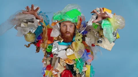 Bearded man dressed in garbage costume doing funny and scary emotion. Slowmotion Video stock 147177917