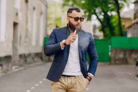 Bearded man with e-cigarette Stock Photos