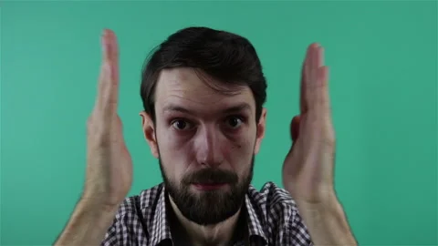 Bearded man funny dance moving head and hands portrait shot Stock Footage 122560914