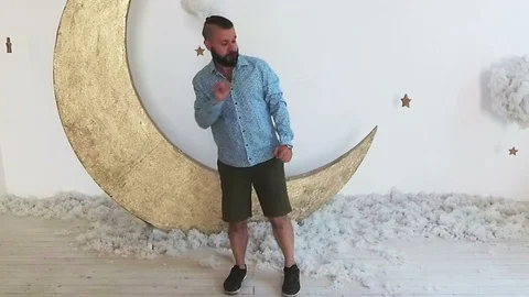 A bearded man is funny dancing like a hip hop stars. Stock Footage 88829415