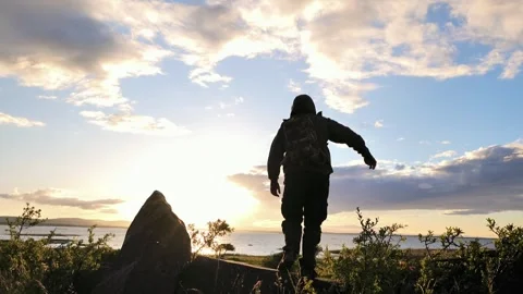 Bearded Man with glasses hiking at sunset, freedom in nature, adventure Video stock 277526337