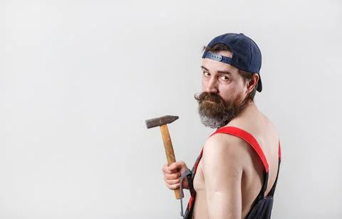 Bearded man with hammer Stock Photos