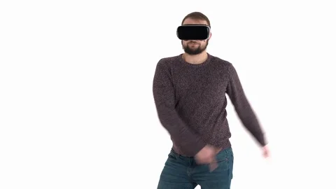 Bearded man having fun with virtual reality glasses moving his hands, enjoying 스톡 동영상 121198916