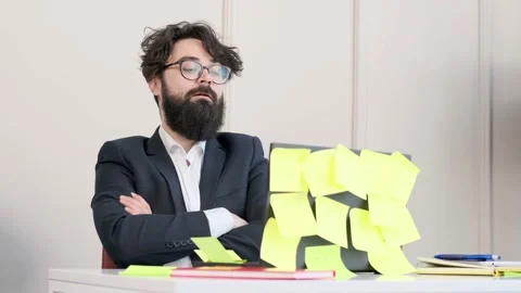 Bearded man having a video call conference, man is tired and falls asleep. Stock Footage 155807777