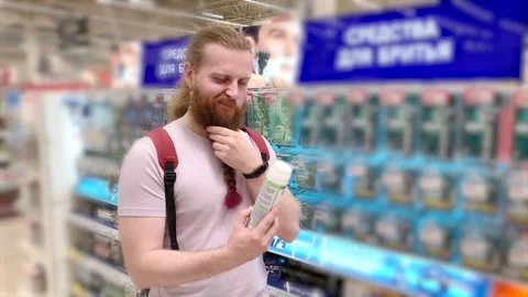 Bearded man hesitates to shave 스톡 동영상 277185494