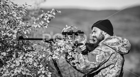Bearded man hunter. Military uniform fashion. Army forces. Camouflage. Hunting Stock Photos