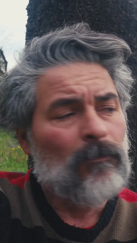 Bearded man making different facial expressions Stock Footage 304369912